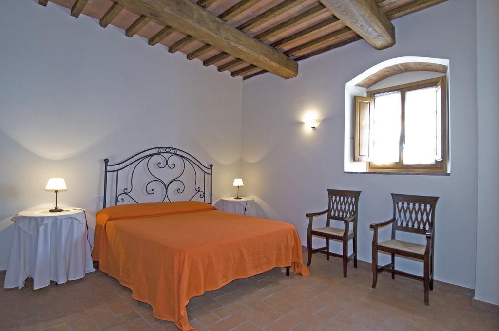 Agriturismo Campo Lungo San Donato in Poggio Pokoj fotografie