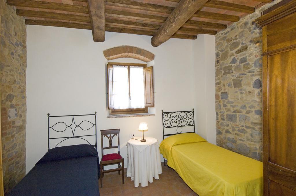 Agriturismo Campo Lungo San Donato in Poggio Pokoj fotografie