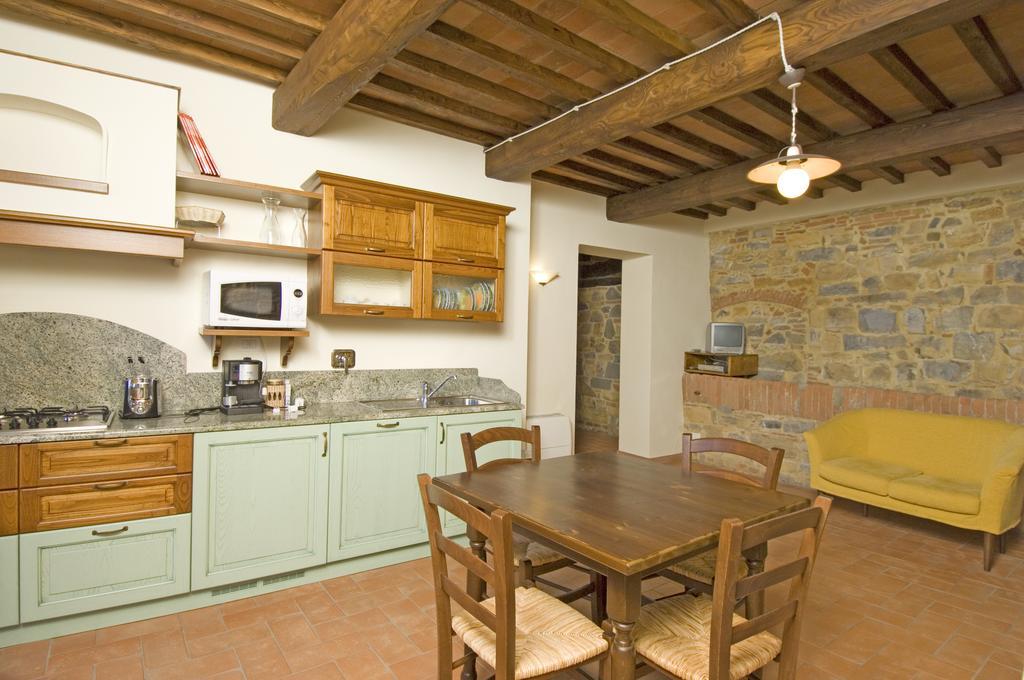 Agriturismo Campo Lungo San Donato in Poggio Pokoj fotografie