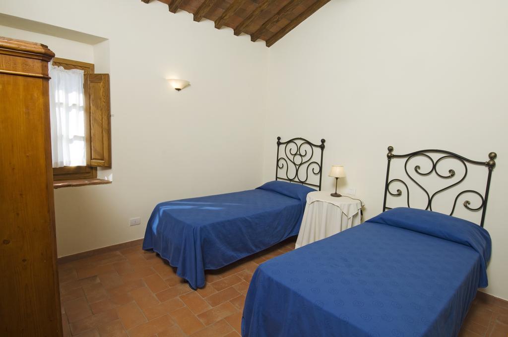 Agriturismo Campo Lungo San Donato in Poggio Pokoj fotografie