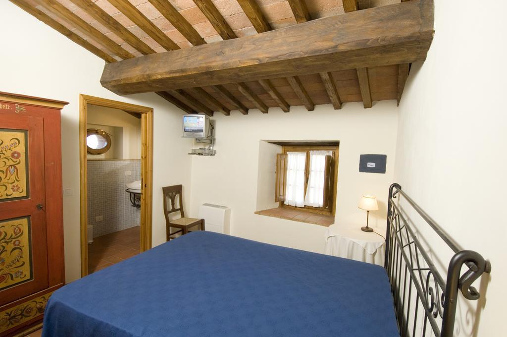 Agriturismo Campo Lungo San Donato in Poggio Pokoj fotografie