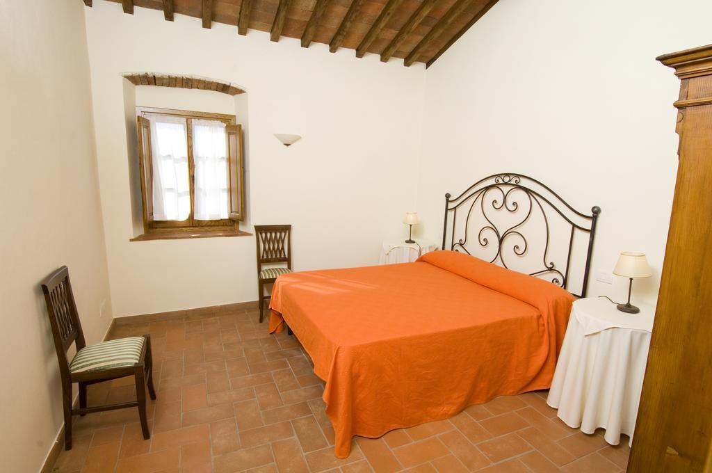 Agriturismo Campo Lungo San Donato in Poggio Pokoj fotografie