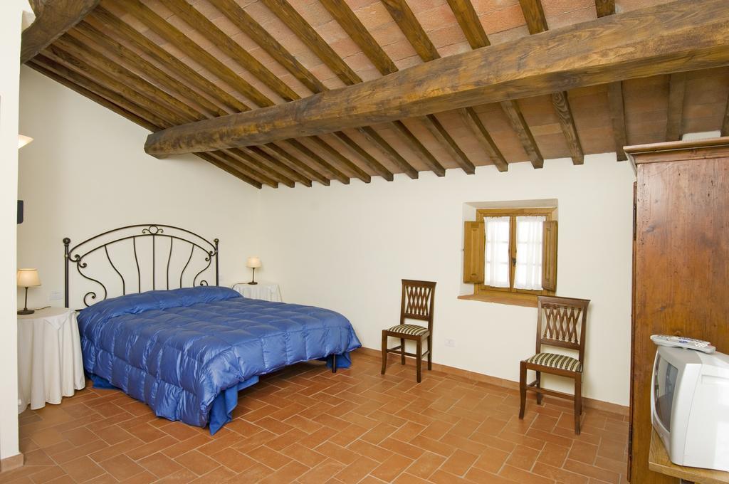 Agriturismo Campo Lungo San Donato in Poggio Pokoj fotografie
