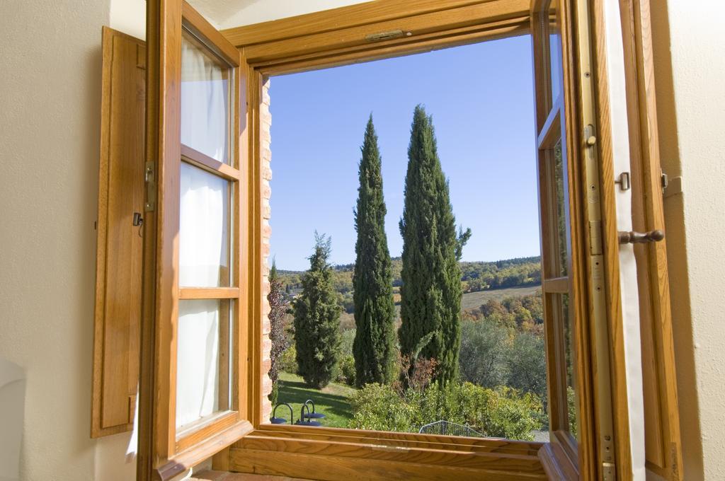 Agriturismo Campo Lungo San Donato in Poggio Pokoj fotografie