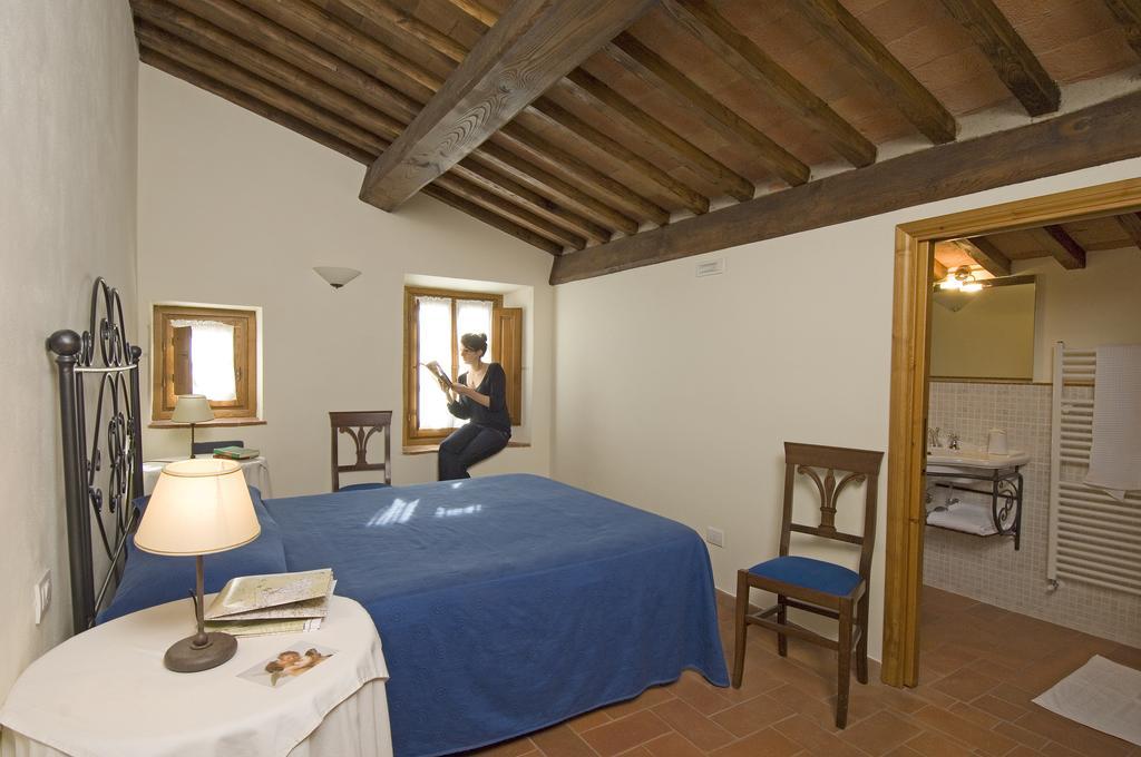 Agriturismo Campo Lungo San Donato in Poggio Pokoj fotografie
