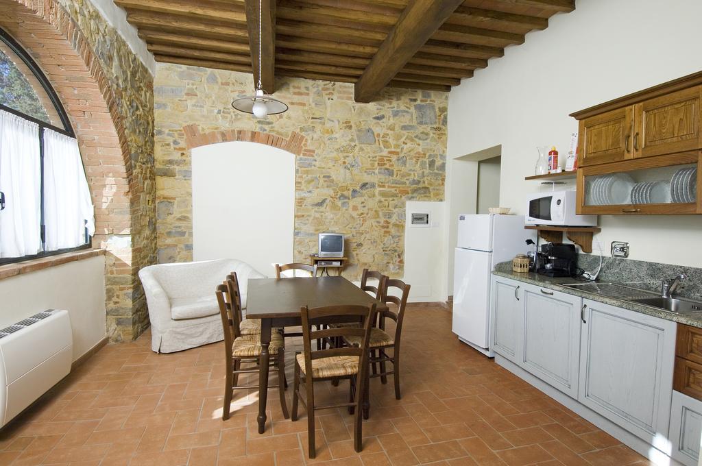 Agriturismo Campo Lungo San Donato in Poggio Pokoj fotografie
